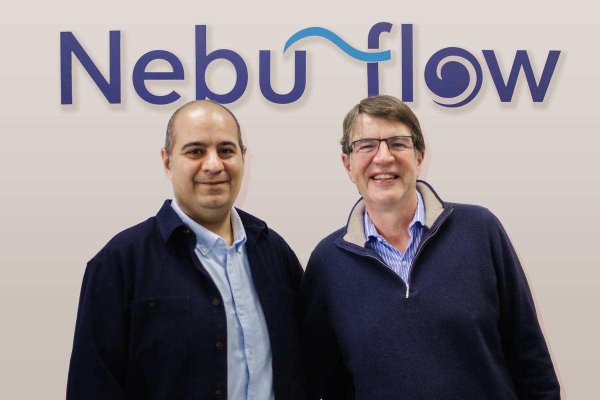 Dr Elijah Nazarzadeh (CEO) and Dr John Pritchard (Chair) stand in front of a wall with the Nebu-Flow logo