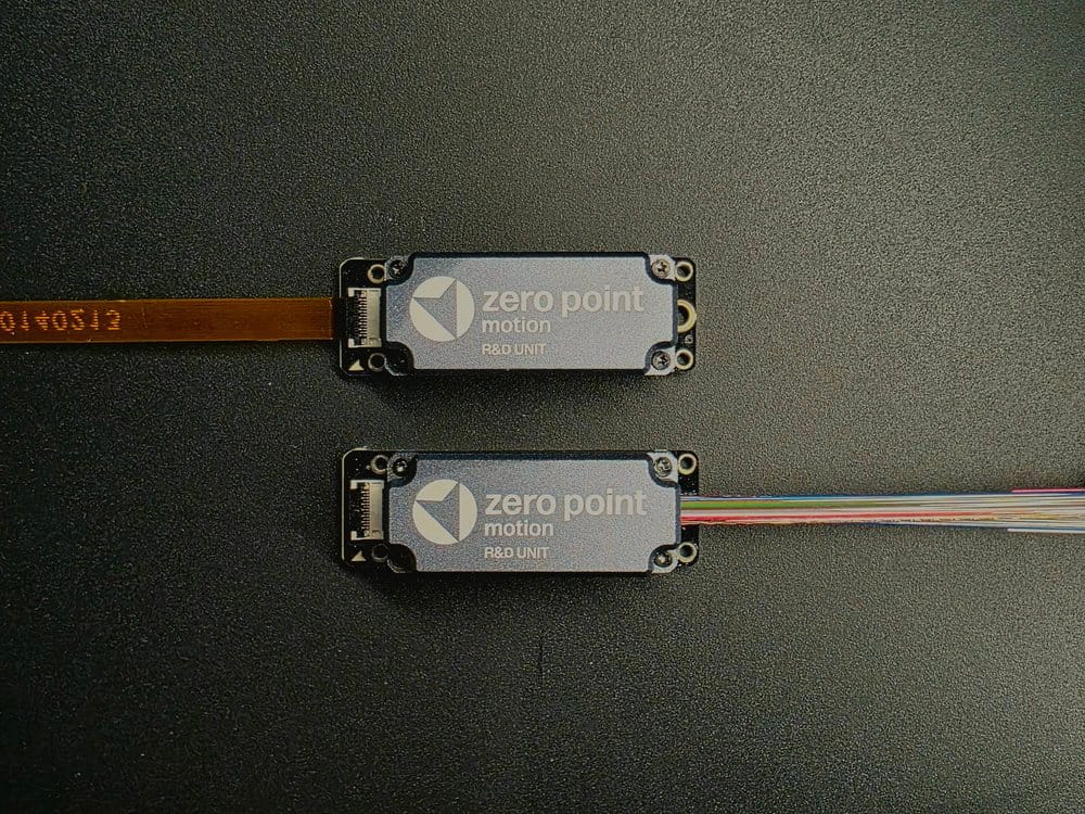 Compact motion sensors by Zero Point Motion, designed for next-gen precision and connectivity in R&D.